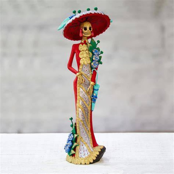 A catrina sculpture in the likeness of Mexican revolutionary Hero Pancho Villa stands at the Zocalo, Mexico City&acute;s main square, during celebrations ahead of the Day of the Dead on Tuesday, Oct. 31, 2023. (AP Photo/Marco Ugarte)