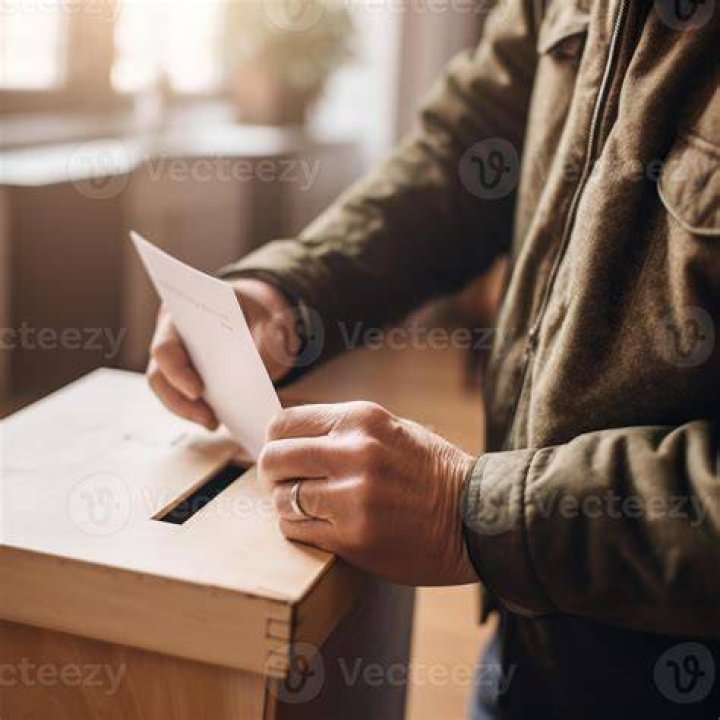 A man casts his ballot at a polling station during a presidential election in Espoo, Finland, Sunday, Feb. 11, 2024. Voters in Finland are choosing Sunday between two experienced politicians to be their next president. (AP Photo/Sergei Grits)