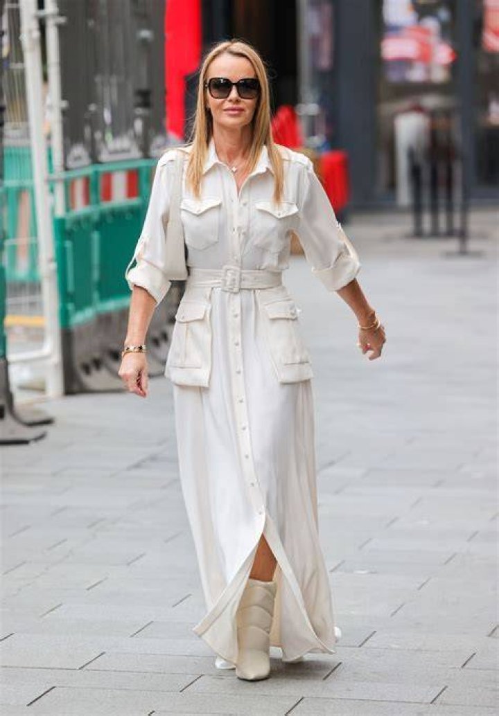 amanda holden wearing white low cut dress with matching gloves