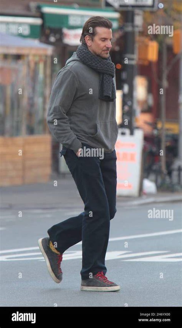 Bradley Cooper seen walking while holding a small coat in New York City on January 5, 2023 | Source: YouTube/The Hollywood Fix