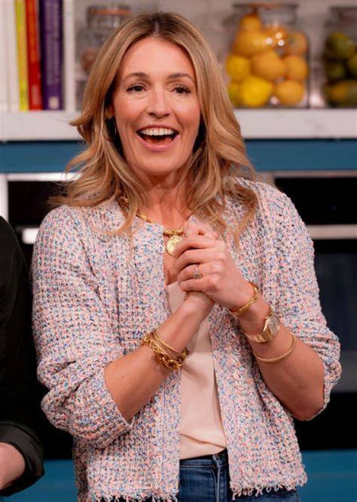 Cat Deeley teamed her cardigan with a satin camisole top and lots of gold jewellery