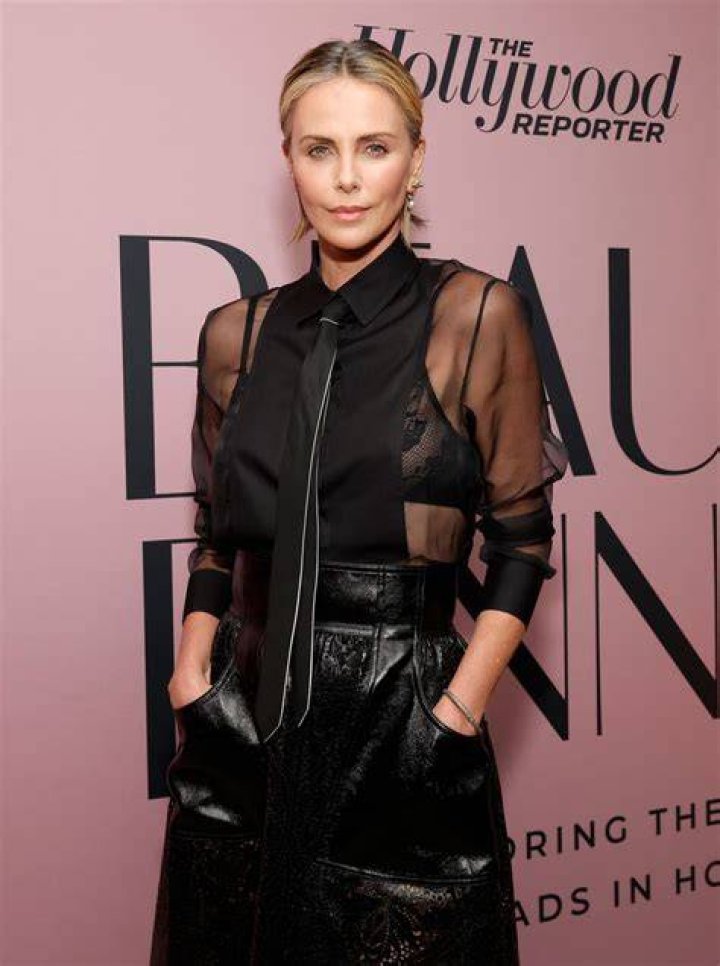 Charlize Theron is a vampy vixen in sheer leather look
