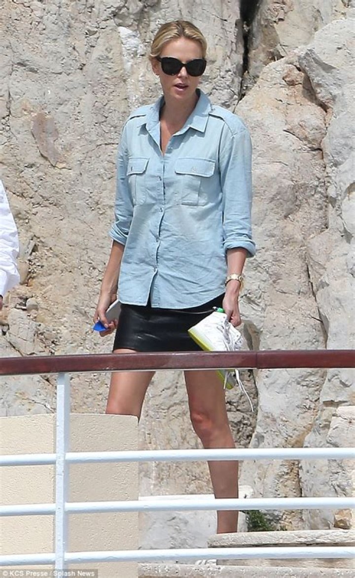 Charlize Theron puts on leggy display in phenomenal mini skirt for star-studded NYC outing