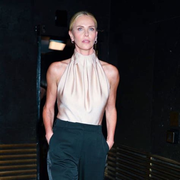 Charlize Theron wears just a necklace for striking Dior campaign photo