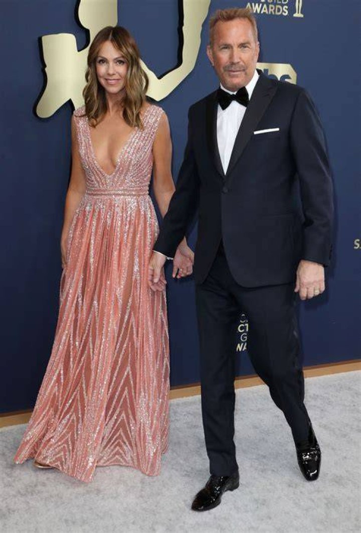 Christine Baumgartner and Kevin Costner attend the 94th Annual Academy Awards at Hollywood and Highland on March 27, 2022 in Hollywood, California