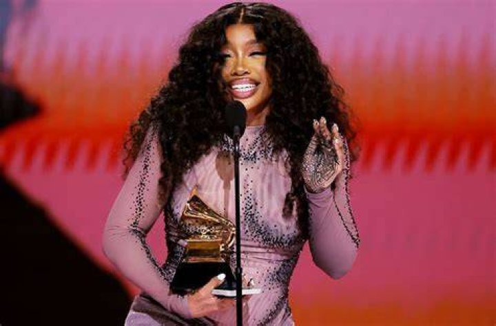 Delicate details: SZA sported the bodysuit and nothing else minus a few dainty pieces of jewelry as she posed against a crisp white background