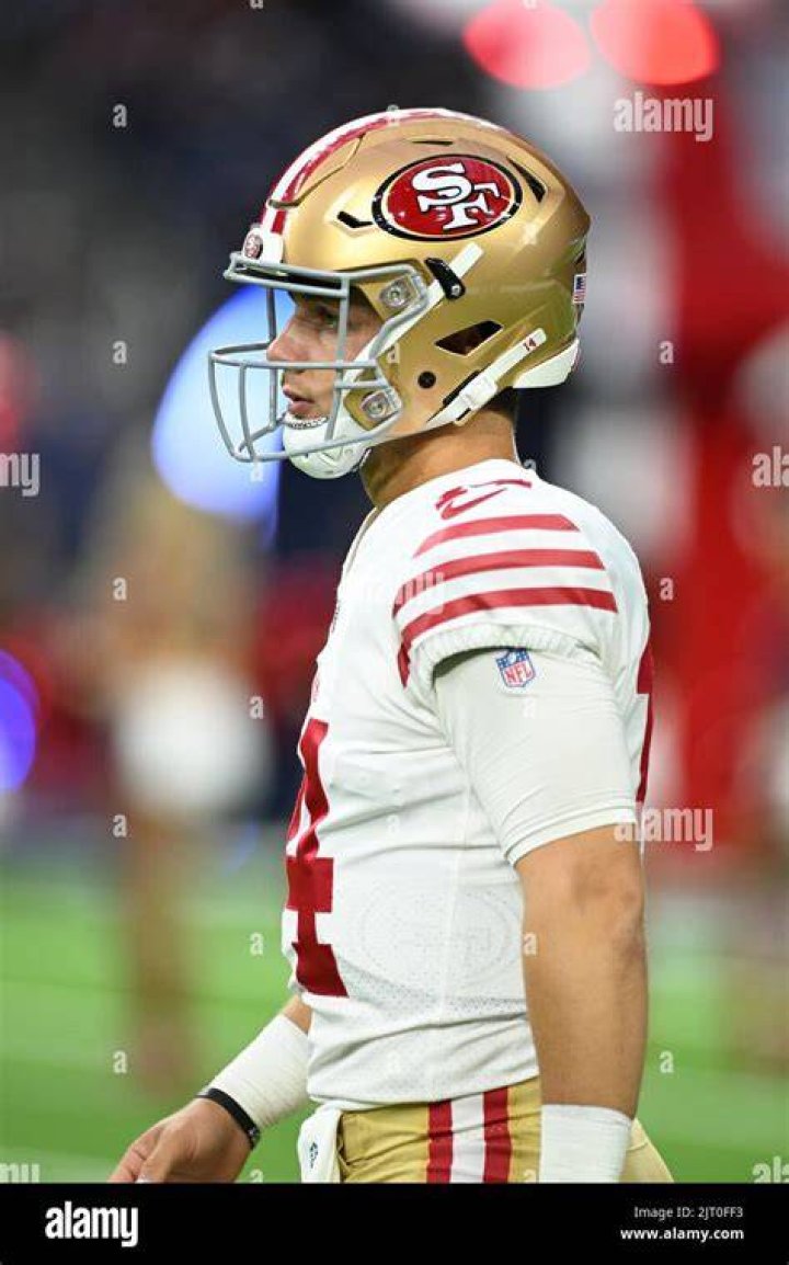 FILE - San Francisco 49ers quarterback Brock Purdy (13) throws against the Arizona Cardinals during the first half of an NFL football game, Sunday, Dec. 17, 2023, in Glendale, Ariz. Brock Purdy is a finalist for The Associated Press 2023 NFL Most Valuable Player award. The winners will be announced at NFL Honors on Feb. 8.(AP Photo/Matt York, File)