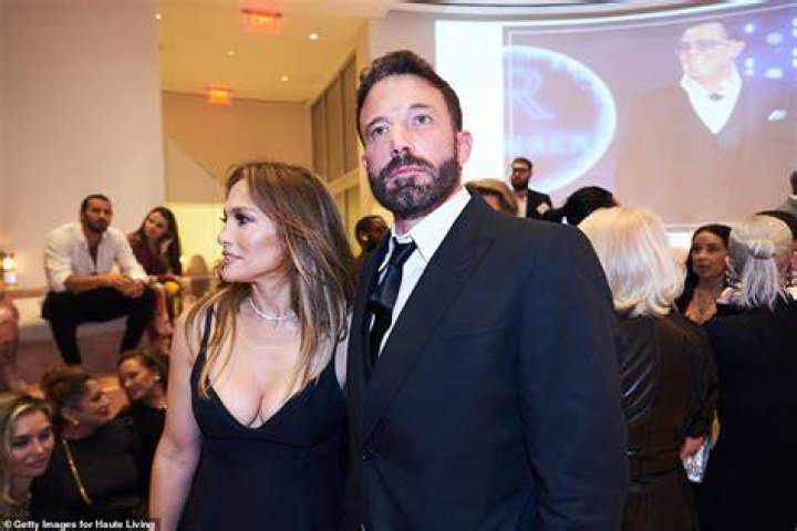 Handsome: Ben - who wed Jennifer in July after rekindling their romance last year - kept it classic in a black suit with a white dress shirt and tie