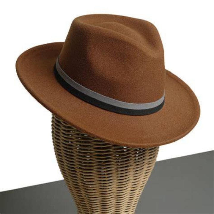 Hat's nice! Chuggs Wallis, 23, is from Surrey, and he's a hat entrepreneur