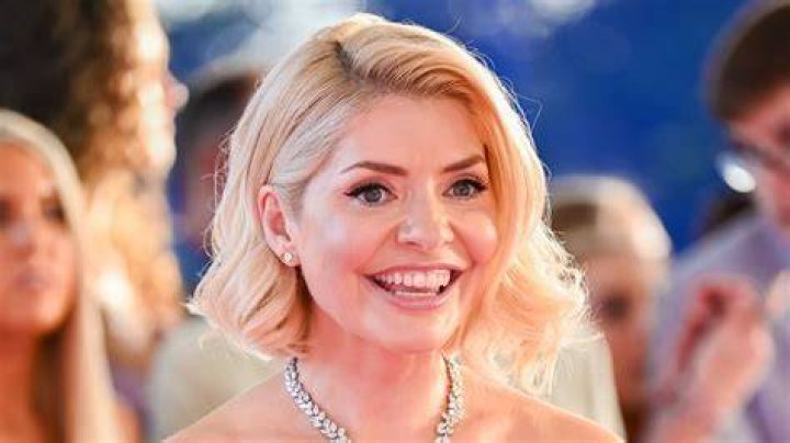 Holly Willoughby, 23, is unrecognisable with long auburn hair and thick fringe