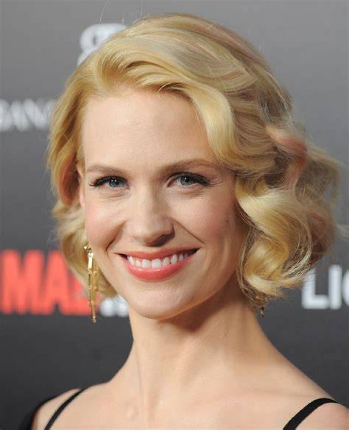 January Jones wears a striking red cutaway jumpsuit