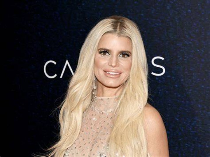 Jessica Simpson pictures with her daughter during a holiday to Aspen