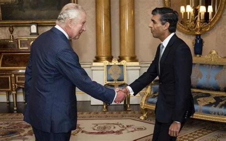 King Charles III welcomes Rishi Sunak during an audience at Buckingham Palace