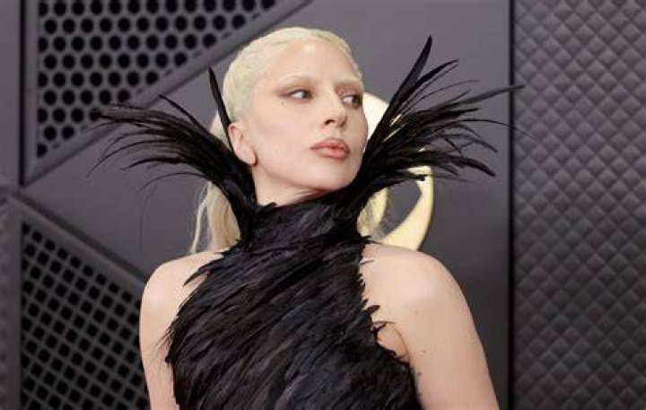 Lady Gaga, wearing a stunning Alexander McQueen suit, was on hand to support Carey Mulligan and Bradley Cooper
