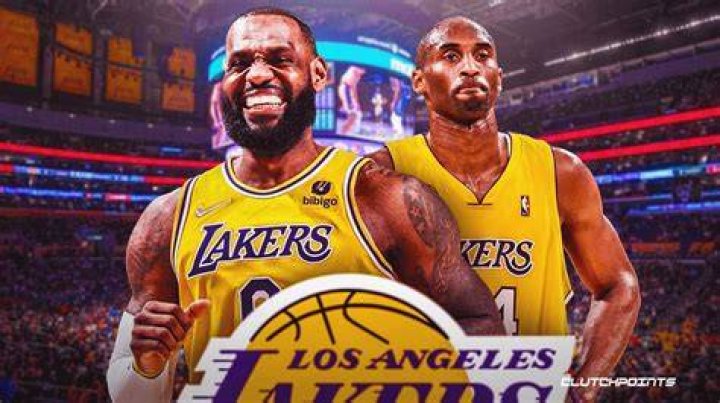 LeBron James and Kobe Bryant stare at each other during a press conference for the London 2012 Olympics, on July 27, 2012, in London, England | Source: Jeff Gross/Getty Images