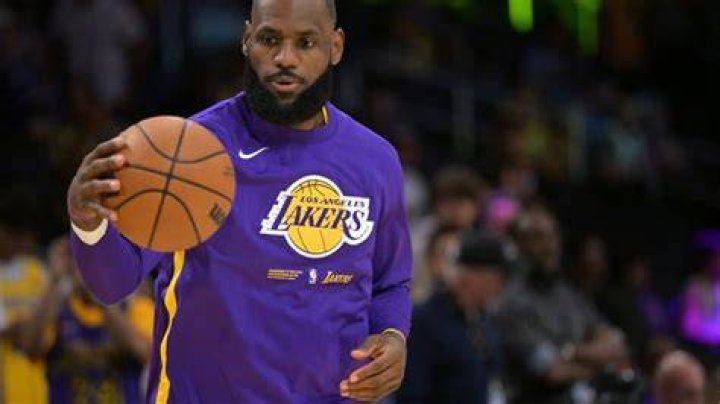 LeBron 'Bronny' James Jr. #0 of Sierra Canyon High School is greeted by his father LeBron James of the Los Angeles Lakers following the Ohio Scholastic Play-By-Play Classic in 2019