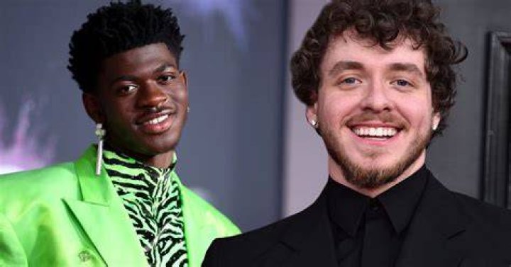 Lil Nas X and Jack Harlow accept an award onstage at the 2022 MTV VMAs at Prudential Center on August 28, 2022, in Newark, New Jersey. | Source: Getty Images