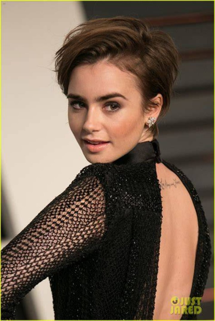 Lily Collins debuts edgy pixie cut at Oscars after party