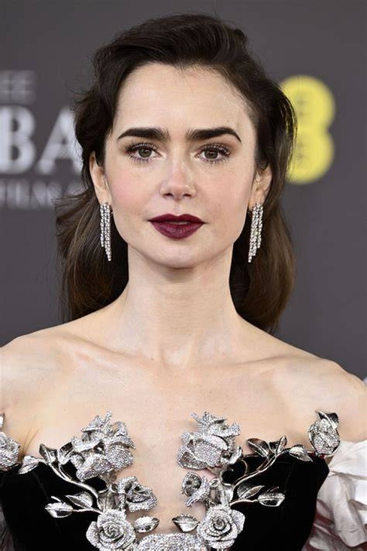 Lily Collins is 'a kid in a candy store' as she preps for the Golden Globes