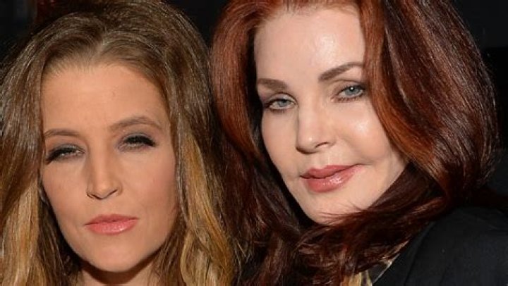 Lisa Marie Presley with her twin daughters Harper Vivienne Anne and Finley Aaron Love on April 5, 2014, in Narita, Japan | Source: Getty Images
