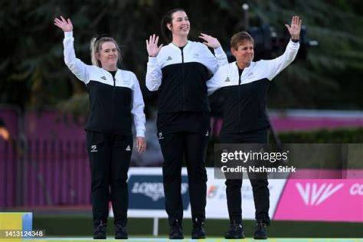 (L-R) Nicole Toomey, Tayla Bruce and Val Smith wave to the crowd as bronze medal winners. Photo / Getty
