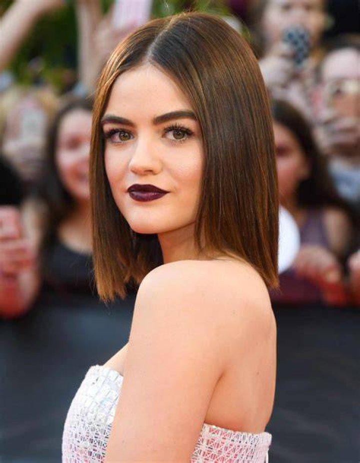 Lucy Hale with her hair in a bob with sharp side parting 