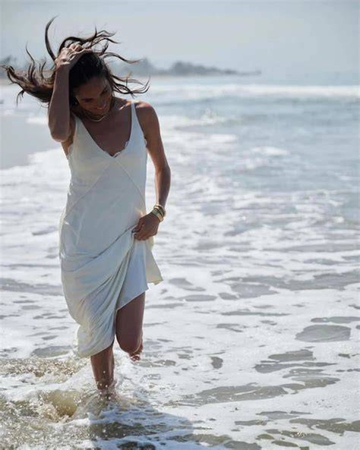 Meghan Markle is a beach babe in scalloped swimsuit in ultra-rare holiday video