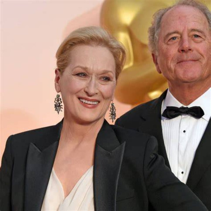 Meryl Streep leaning into husband Don Gummer