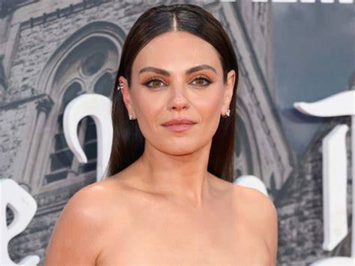Mila Kunis comforts her teary-eyed mother, Elvira Kunis | Source: