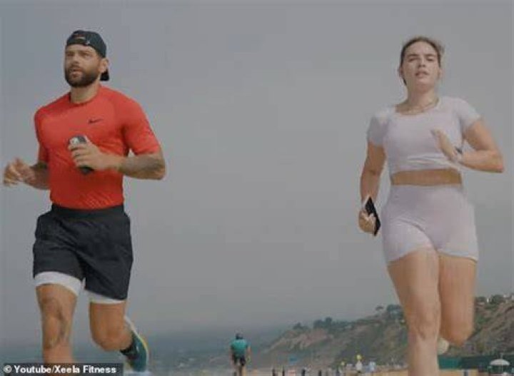 Natalie trained under the instruction of her childhood friend Ilya Fedorovich (left), who is owns the fitness and supplement company Xeela