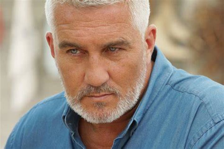 Paul Hollywood in red show in baking tent 