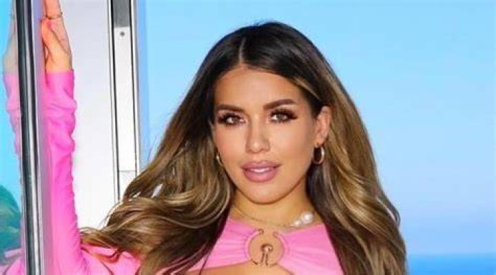 Perfect in pink: Chantel sported a bright red pair of rectangular glasses as she walked to her car in her pink the LA sunshine