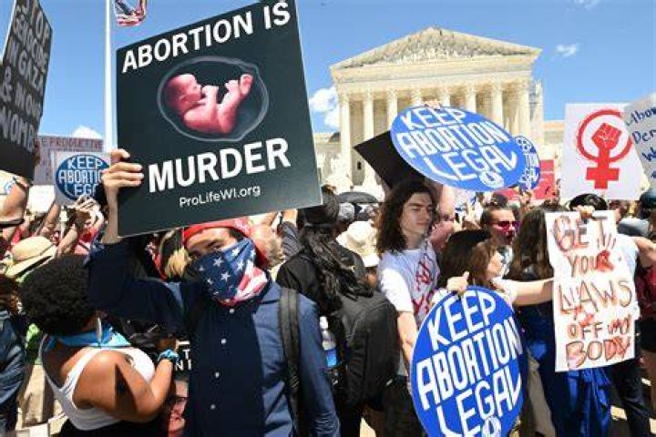 PHOTO: Anti-abortion rights demonstrators protest during a Women's March in Austin, Texas, , Oct. 8, 2022.