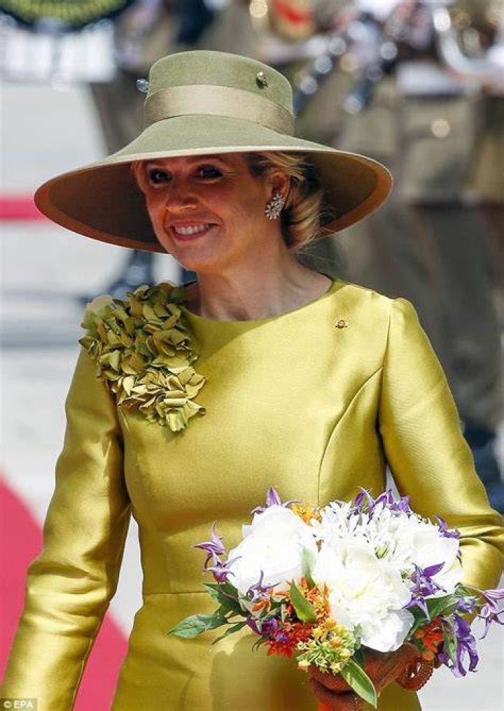 Queen Maxima in chartreuse hat and dress