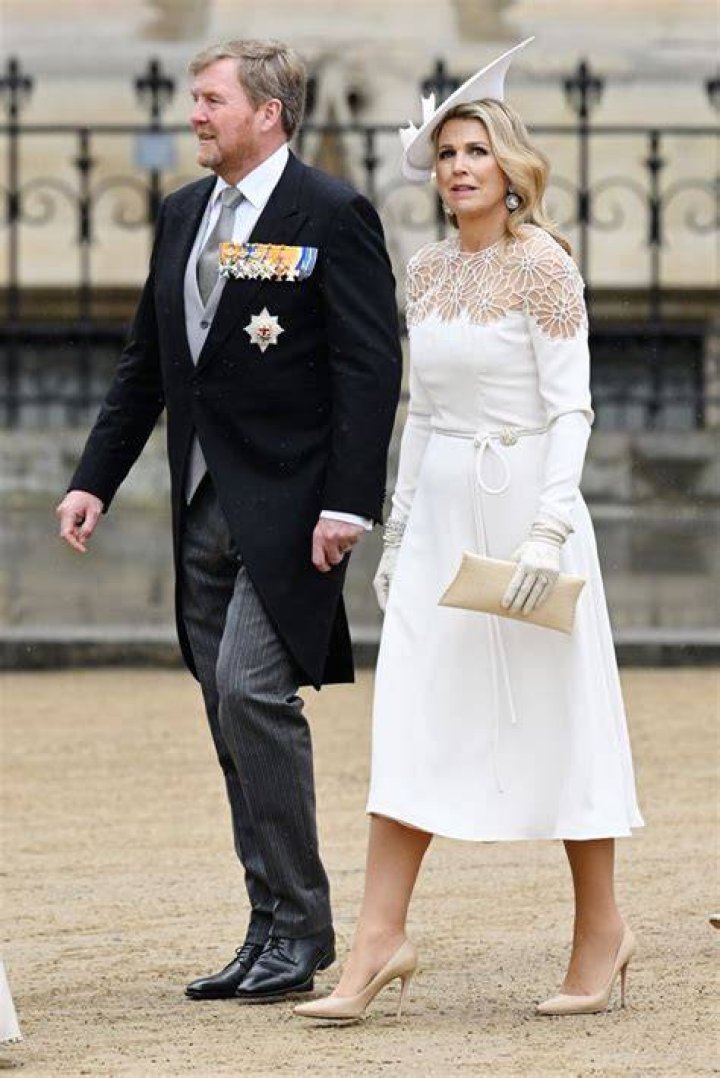 Queen Maxima in ivory jacket and headband