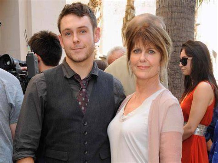 Sean Harmon and Pam Dawber at Mark Harmon's Hollywood Walk of Fame star ceremony in Hollywood, 2012 | Source: Getty Images