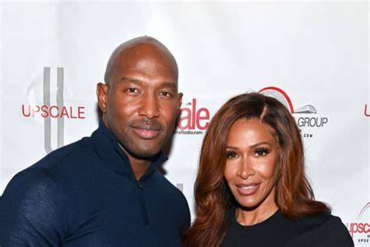 Sheree Whitfield and Martell Holt