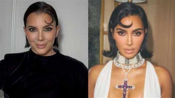 Side by side: Kim is pictured beside Khloe in the audience at the Atlanta event