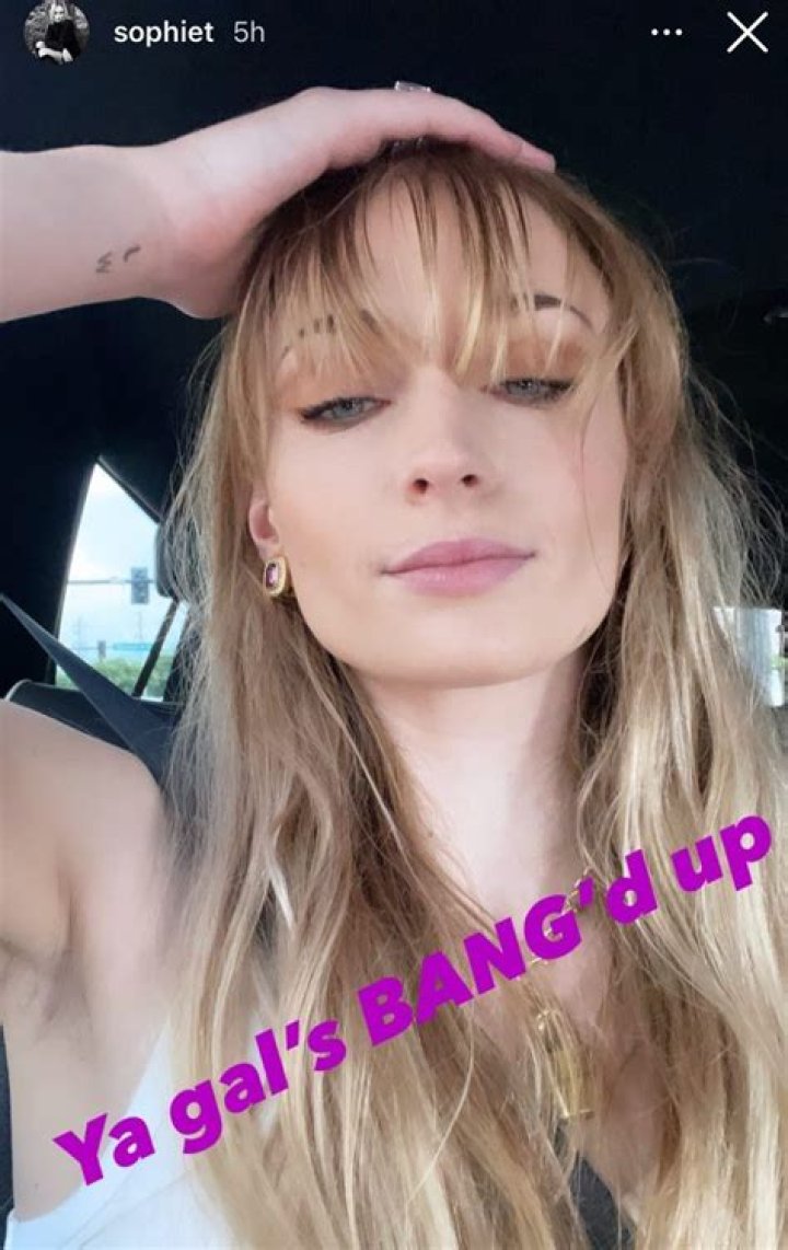 Sophie Turner Added Blunt Bangs to Her WaistLength Red Hair See Photo Allure