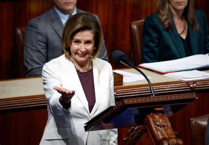 Speaker of the House Nancy Pelosi, D-Calif., and Vice President Mike Pence arrive to officiate as a joint session of the House and Senate convenes to count the Electoral College votes cast in November's election, at the Capitol in Washington, Wednesday, Jan. 6, 2021. (AP Photo/J. Scott Applewhite)