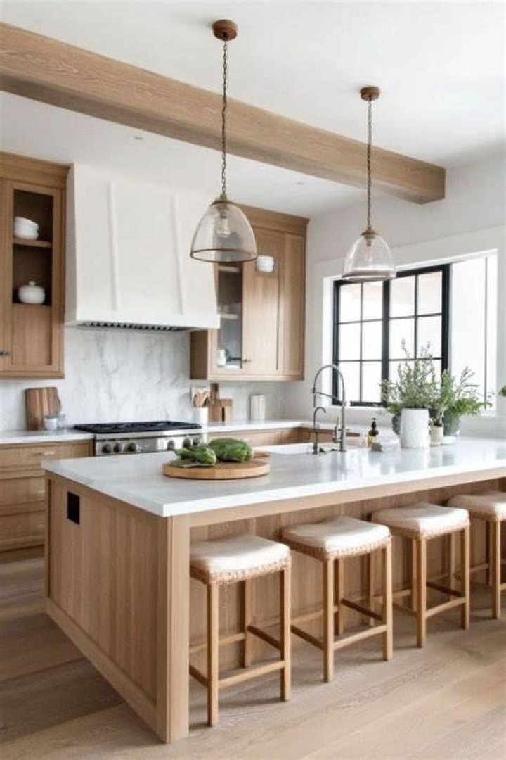 white kitchen with warm wood accents