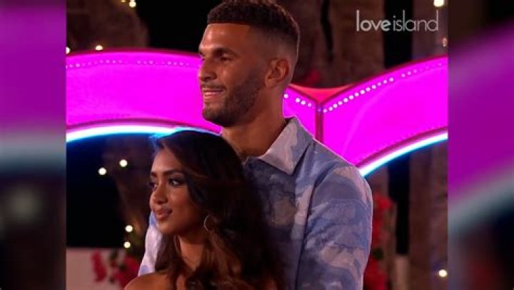 Winning moment: Love Island's Olivia Attwood won the race beating Lucrezia Millarini who finished runner-up at the London Aquatics Centre