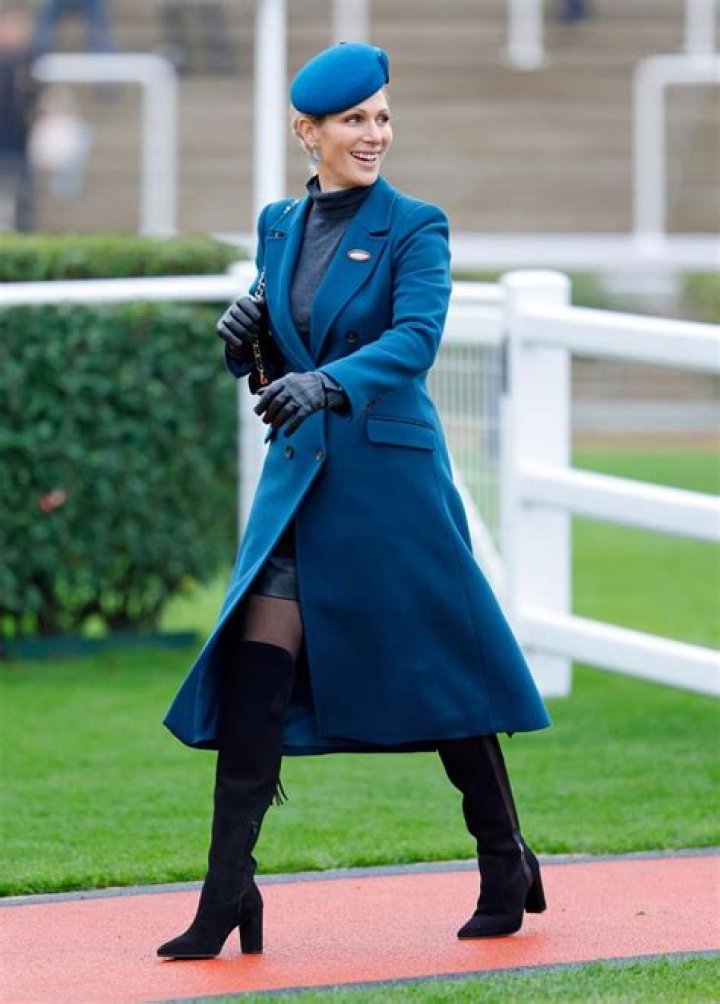 Zara Tindall in a blue and white dress with a pixie haircut