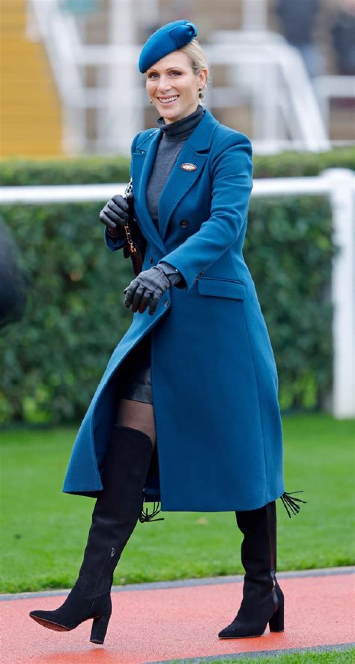 Zara Tindall in a teal coat dress over her baby bump with husband Mike